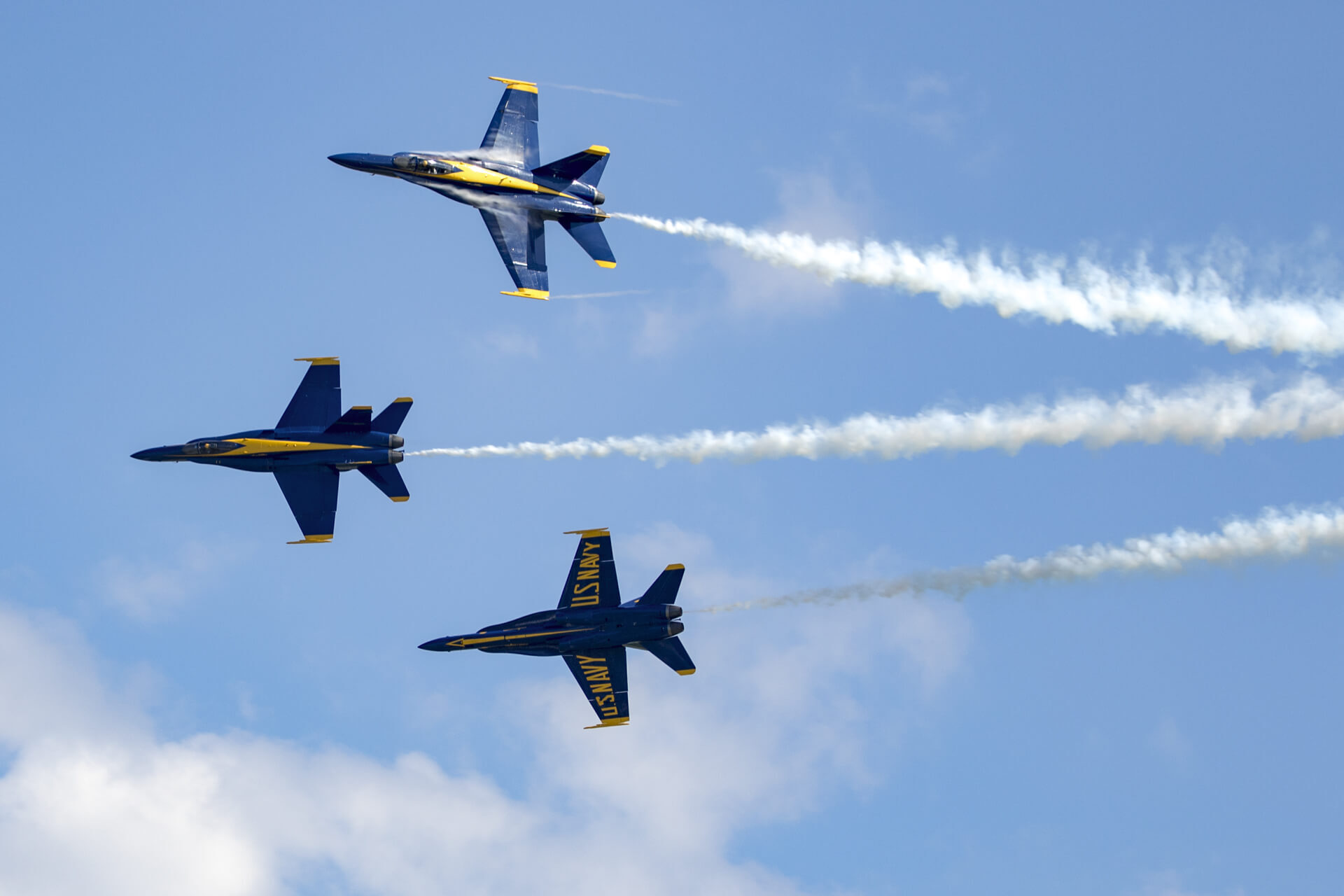 Blue Angels performing a high-speed breakaway maneuver.