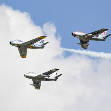 Three F-86 Sabres flying in formation.
