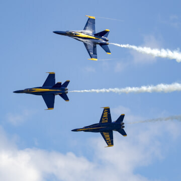 Blue Angels performing a high-speed breakaway maneuver.