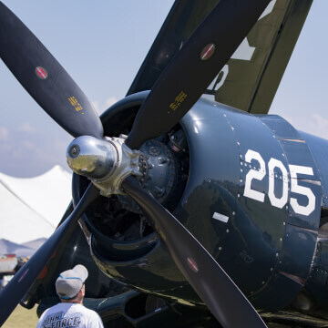 Showing off the scale of the Vought F4U-4B Corsair's 13ft tall propeller.