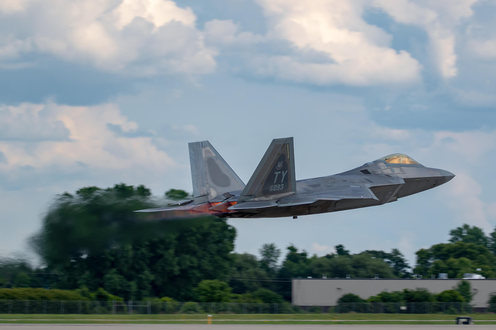 F-22 Raptor takes off for AirVenture demonstration.