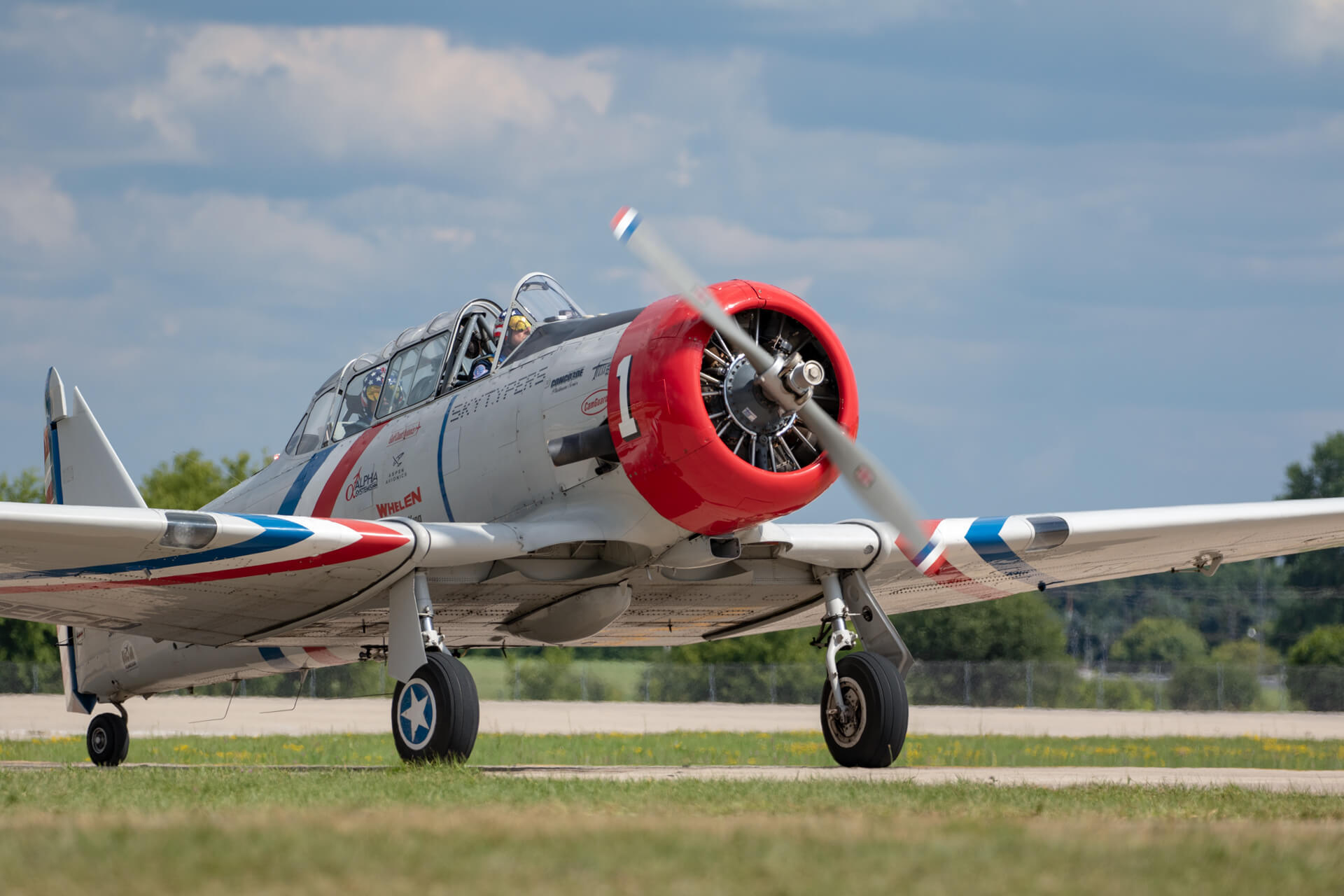 Andy Travnicek, landing his SNJ-2 Texan, the #1 plane of the GEICO Skytypers.