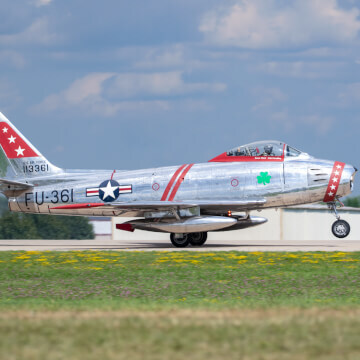 North American Aviation F-86E Sabre taking off during EAA AirVenture 2018.