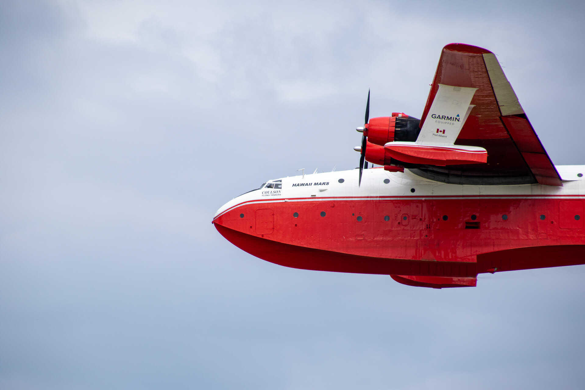The Martin JRM Mars, can land on water and carry it.