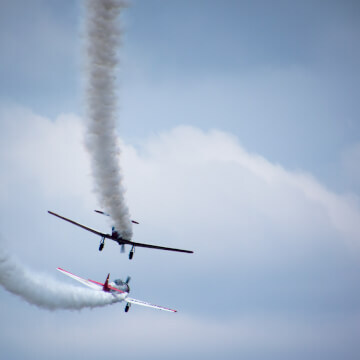 The Aeroshell Aerobatic Team playing tag in their 1938 T-6 Texans.