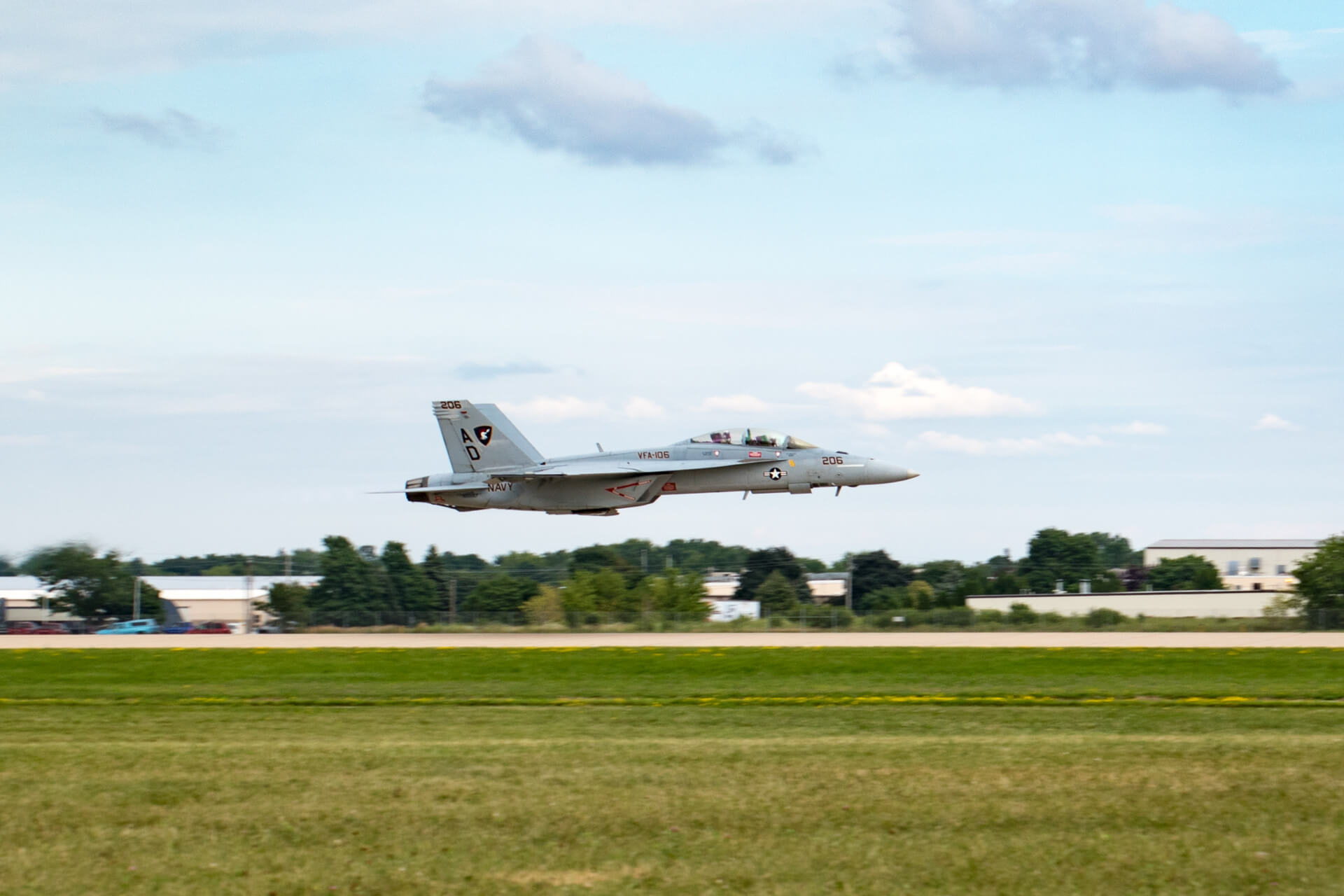 An F/A-18F Super Hornet takes off at AirVenture.